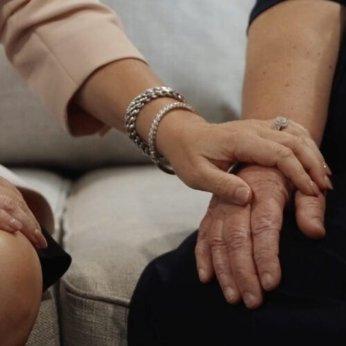 A Georgia medical malpractice lawyer at Brodie Law Group holding a client's hand